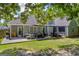 Spacious backyard featuring an outdoor patio area with seating, providing an ideal space for entertainment at 3511 Cherry Blossom Ct, Loganville, GA 30052