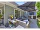 Inviting outdoor patio area with comfortable seating and ample space for relaxing and entertaining at 3511 Cherry Blossom Ct, Loganville, GA 30052