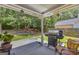 Charming covered patio with a grill, perfect for outdoor entertaining at 3511 Cherry Blossom Ct, Loganville, GA 30052