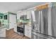 Bright kitchen featuring stainless steel appliances, ample storage, and a clean, modern aesthetic at 3511 Cherry Blossom Ct, Loganville, GA 30052