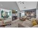 Spacious living room showcasing hardwood floors, a fireplace, and an open-concept design at 3511 Cherry Blossom Ct, Loganville, GA 30052