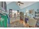Spacious walk-in closet boasting a dressing area with natural light, custom dresser and lots of storage at 3511 Cherry Blossom Ct, Loganville, GA 30052