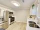 Bright kitchen with stainless steel appliances, white cabinets, and modern countertops at 1399 Cutters Mill Dr, Lithonia, GA 30058
