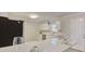 Clean, modern kitchen with white cabinets, quartz counters, and stainless steel appliances at 1399 Cutters Mill Dr, Lithonia, GA 30058