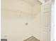 Laundry room with washer/dryer hookups and hardwood floors at 1399 Cutters Mill Dr, Lithonia, GA 30058