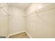 Walk-in closet features shelving units and hardwood floors at 1399 Cutters Mill Dr, Lithonia, GA 30058