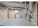 Unfinished basement area with mechanical systems and storage options at 522 Golfview, Peachtree City, GA 30269