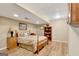 Cozy bedroom featuring hardwood floors and natural light at 522 Golfview, Peachtree City, GA 30269
