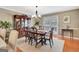 Spacious dining room with hardwood floors, chandelier, and built-in china cabinet at 522 Golfview, Peachtree City, GA 30269