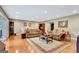 Expansive living room featuring hardwood floors and comfortable seating arrangement at 522 Golfview, Peachtree City, GA 30269