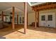 Spacious covered patio with exposed columns, ideal for outdoor entertaining and relaxation at 522 Golfview, Peachtree City, GA 30269