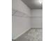 Spacious walk-in closet with built-in shelving, ready for organization at 313 Westfall Ter # 225A, Loganville, GA 30052