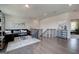 Open-concept living area boasts hardwood floors, recessed lighting, and stylish decor at 313 Westfall Ter # 225A, Loganville, GA 30052