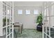 Well-lit office with French doors, shiplap accent wall, and cozy seating area at 313 Westfall Ter # 225A, Loganville, GA 30052