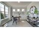 Bright office space with large window and stylish decor at 313 Westfall Ter # 225A, Loganville, GA 30052