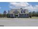 Front of the pool house with parking in front in a community with quick access to dining, shopping, and entertainment at 313 Westfall Ter # 225A, Loganville, GA 30052