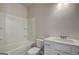 Bathroom featuring a shower and tub combo, toilet, and vanity with white cabinets at 605 Somerset Ct # 161A, Loganville, GA 30052