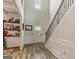 Grand foyer showcasing staircase, hardwood floors, and ample natural light at 209 Osier Dr, Mcdonough, GA 30252