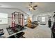 Spacious gym offering multiple workout stations, ample lighting, and various fitness equipment at 209 Osier Dr, Mcdonough, GA 30252