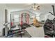 Bright, spacious gym filled with varied workout equipment and natural light from windows at 209 Osier Dr, Mcdonough, GA 30252