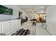 Large gym space includes modern workout equipment, cabinets and seating area at 209 Osier Dr, Mcdonough, GA 30252