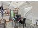 Home office featuring built-in shelving, a stylish desk, and ample lighting at 209 Osier Dr, Mcdonough, GA 30252