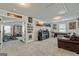 Large upstairs entertainment area with a pool table and custom superhero decor at 209 Osier Dr, Mcdonough, GA 30252