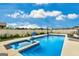 Sparkling swimming pool with hot tub, lounge chairs, and basketball hoop for outdoor fun at 209 Osier Dr, Mcdonough, GA 30252