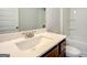 Bathroom featuring a white sink, vanity, toilet, and tub-shower combination at 714 Bristol Dr # 279A, Loganville, GA 30052