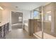 This bathroom includes a soaking tub and glass-enclosed shower at 714 Bristol Dr # 279A, Loganville, GA 30052
