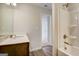 Bathroom features a vanity with a sink and a tub-shower combination with bronze fixtures at 714 Bristol Dr # 279A, Loganville, GA 30052