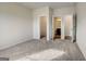 This bedroom features a closet, an ensuite bathroom, and soft carpet at 714 Bristol Dr # 279A, Loganville, GA 30052