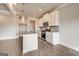 Modern kitchen with stainless steel appliances, granite countertops, and island at 714 Bristol Dr # 279A, Loganville, GA 30052