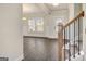 Open-concept living room features hardwood floors, wainscoting, and ample natural light at 714 Bristol Dr # 279A, Loganville, GA 30052