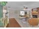 Open-concept living room with fireplace, neutral tones, and ample natural light at 81 Bowers Rd, Moreland, GA 30259