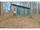 View of backyard shed with a fence featuring secure storage at 81 Bowers Rd, Moreland, GA 30259