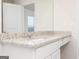 Bright bathroom vanity features modern sink, granite countertop, and white cabinets at 100 Avondale Blvd, Conyers, GA 30013