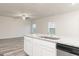 Open floor plan features stainless steel appliances and granite countertops at kitchen island at 100 Avondale Blvd, Conyers, GA 30013