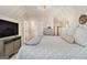Spacious bedroom features neutral tones and modern lighting at 1718 Ridgewood Ne Dr, Atlanta, GA 30307