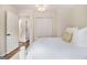 Inviting bedroom showcasing a comfortable bed, neutral decor, closet, and ensuite bathroom, perfect for relaxation at 1718 Ridgewood Ne Dr, Atlanta, GA 30307