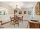 Elegant dining room with hardwood floors, wainscoting, and stylish chandelier at 1718 Ridgewood Ne Dr, Atlanta, GA 30307