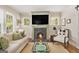 Cozy living room featuring a fireplace, comfortable seating, and natural light at 1718 Ridgewood Ne Dr, Atlanta, GA 30307