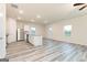 Spacious living room featuring luxury vinyl plank flooring and natural light at 284 Limestone Circle, Conyers, GA 30013