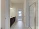 Bright bathroom with a double vanity, tiled flooring, a glass shower, and neutral finishes, creating a clean and modern space at 402 Westmarch Cir # 285A, Loganville, GA 30052