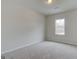 Cozy bedroom with neutral carpet with view from window at 402 Westmarch Cir # 285A, Loganville, GA 30052