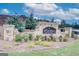Stone community sign with lush landscaping at The Enclave at Logan Point at 402 Westmarch Cir # 285A, Loganville, GA 30052