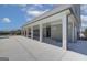 Outdoor pool house with lounge areas and concrete deck at 402 Westmarch Cir # 285A, Loganville, GA 30052