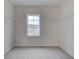 Walk-in closet with wire shelving and a window, offering ample storage and natural light at 402 Westmarch Cir # 285A, Loganville, GA 30052