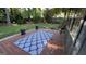 View of patio featuring brick pavers and a rug with shell design at 4710 Cedar Brook Se Dr, Conyers, GA 30094