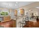 Kitchen with stainless appliances, granite counters, and breakfast bar is perfect for entertaining guests at 9360 Ward Rd, Winston, GA 30187